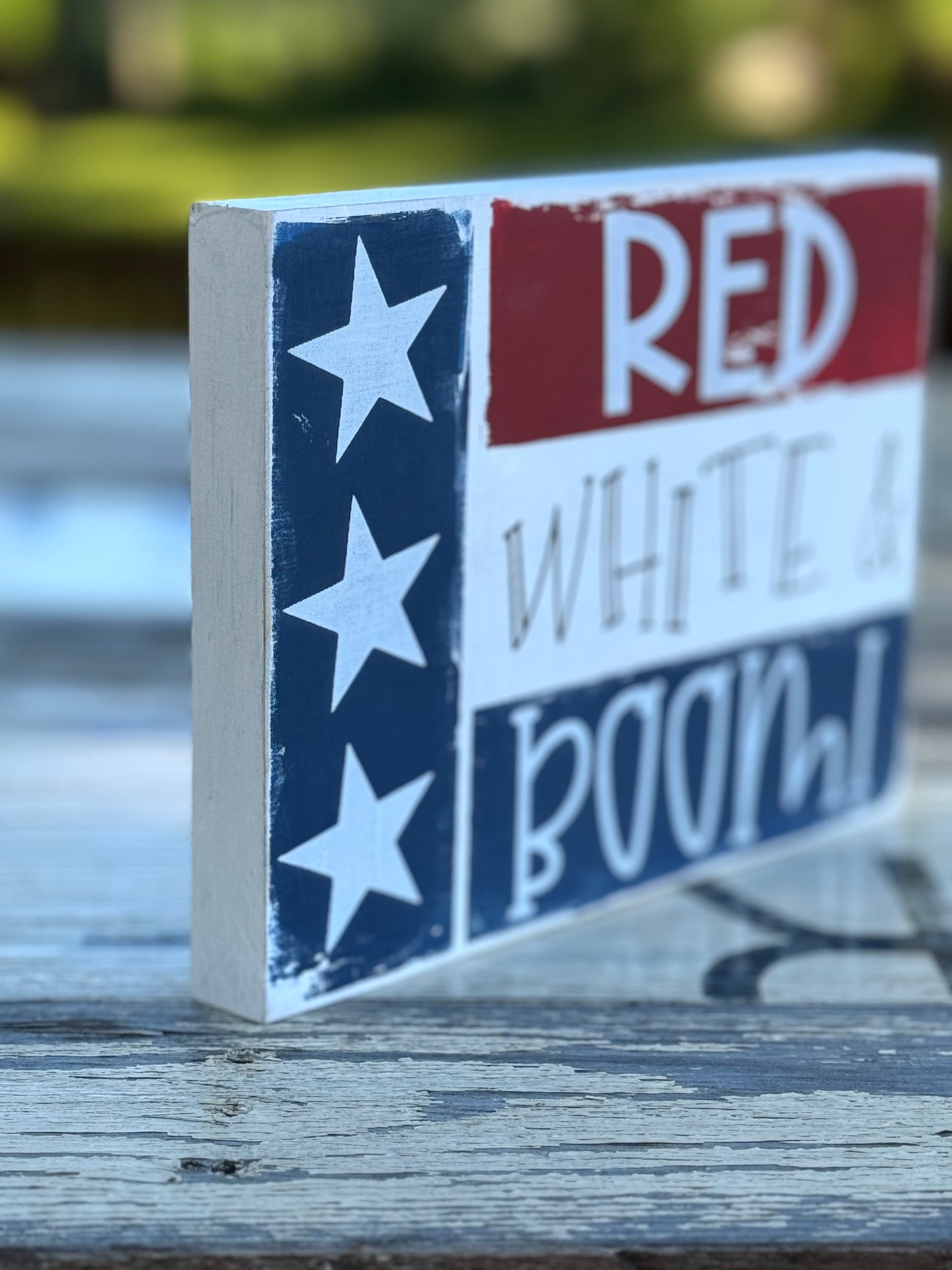 RED WHITE AND BOOM WOOD SIGN