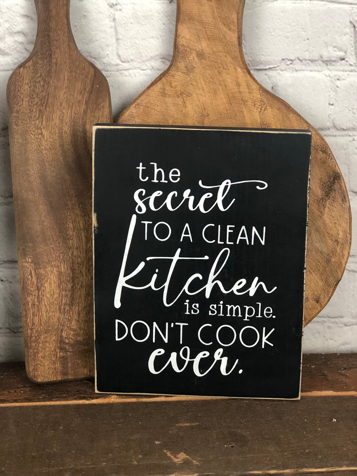 IT IS FINISHED/ THE SECRET TO A CLEAN KITCHEN IS TO NOT COOK EVER- DOUBLE SIDED WOOD SIGN