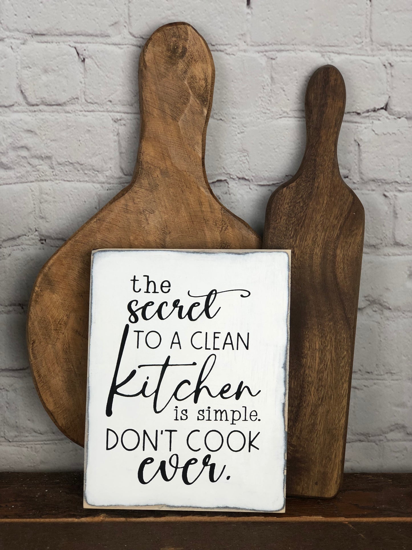 IT IS FINISHED/ THE SECRET TO A CLEAN KITCHEN IS TO NOT COOK EVER- DOUBLE SIDED WOOD SIGN