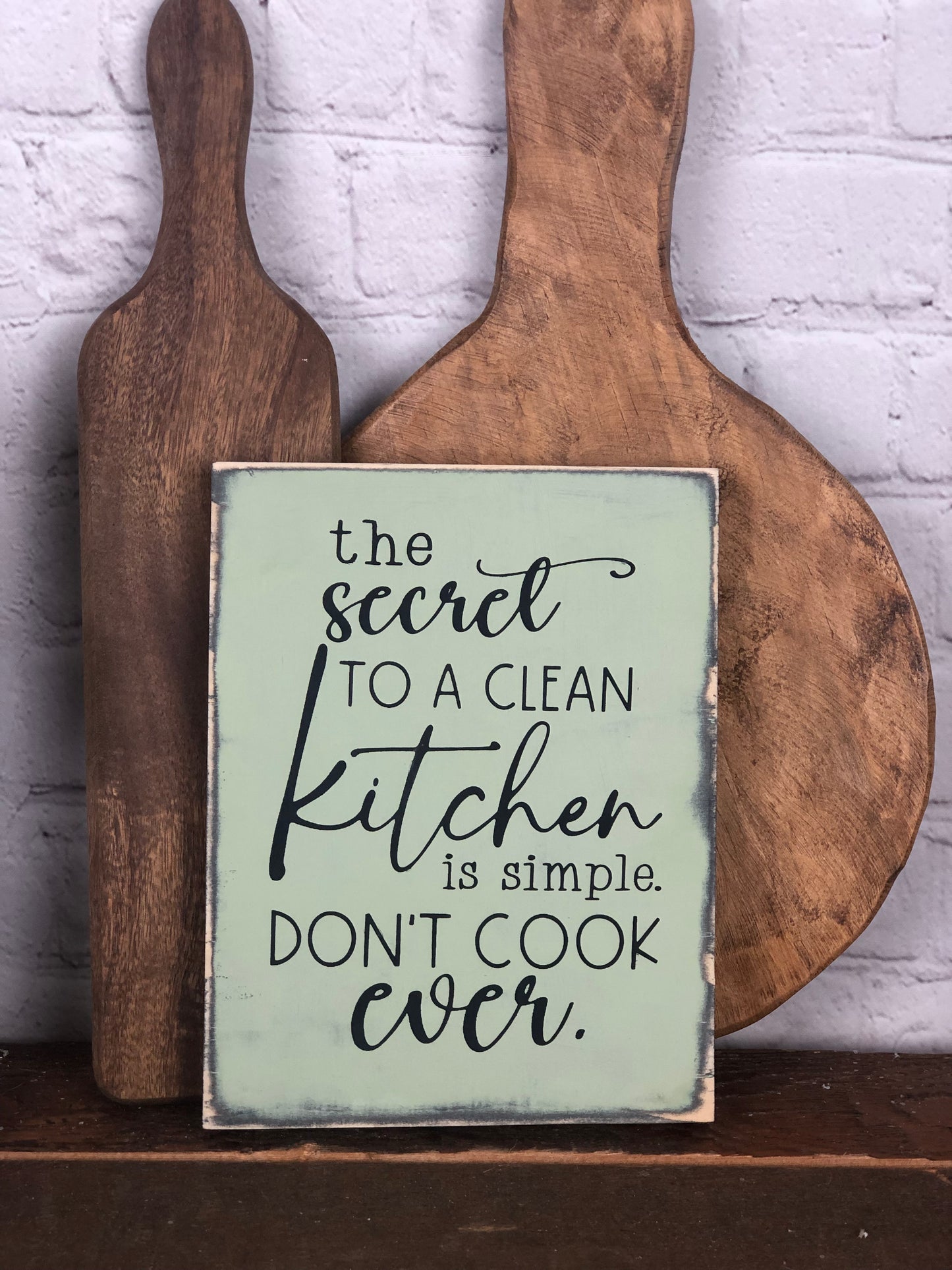 IT IS FINISHED/ THE SECRET TO A CLEAN KITCHEN IS TO NOT COOK EVER- DOUBLE SIDED WOOD SIGN