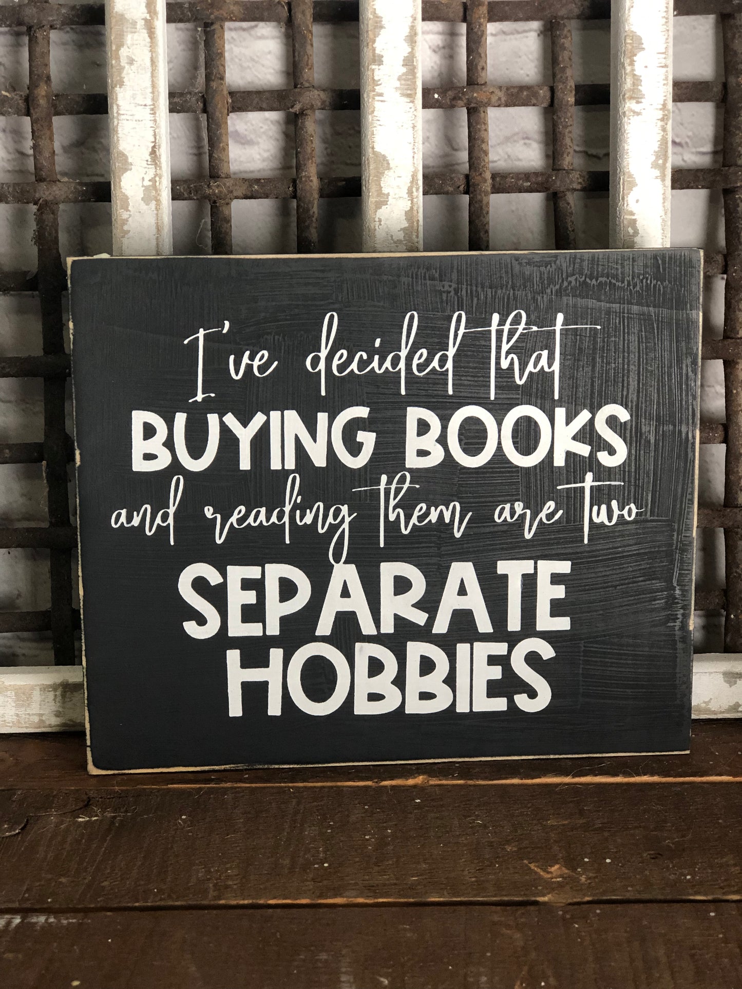I'VE DECIDED THAT BUYING BOOKS AND READING THEM ARE TWO SEPARATE HOBBIES - WOOD SIGN