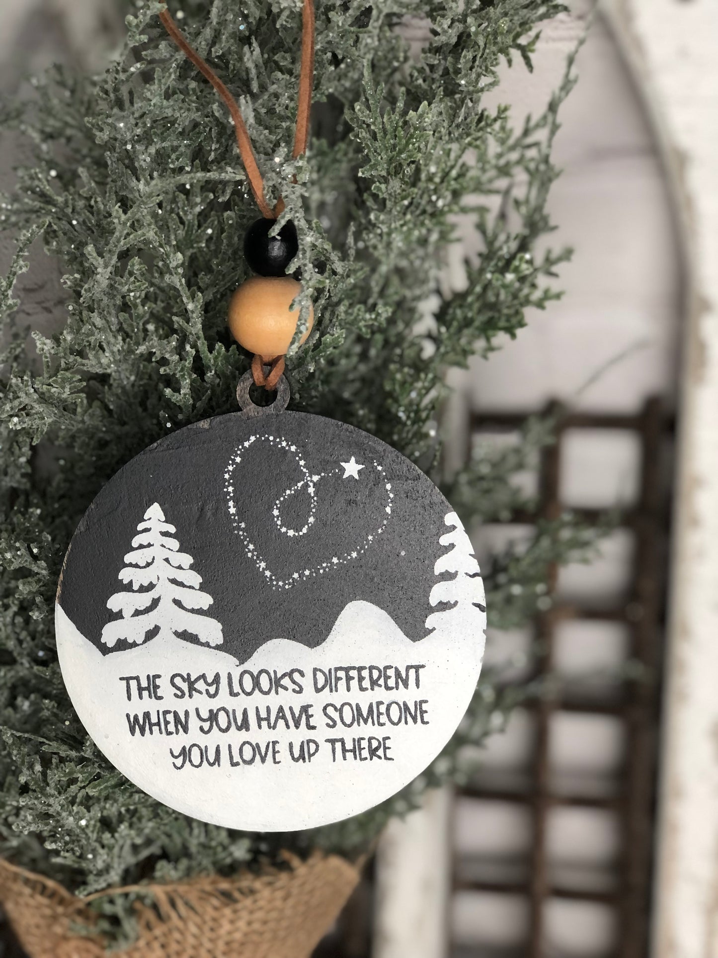 CHRISTMAS ORNAMENT -  THE SKY LOOKS DIFFERENT WHEN SOMEONE YOU LOVE IS UP THERE