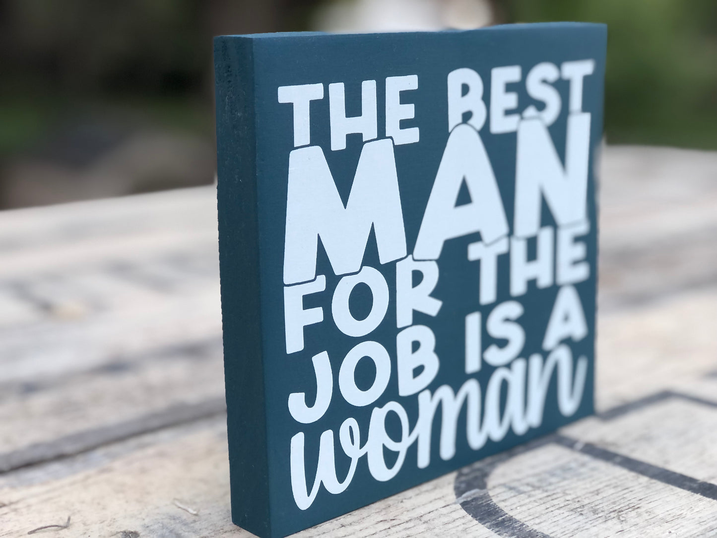 THE BEST MAN FOR THE JOB IS A WOMAN -WE’RE ALL CRAZY -WOOD SIGN