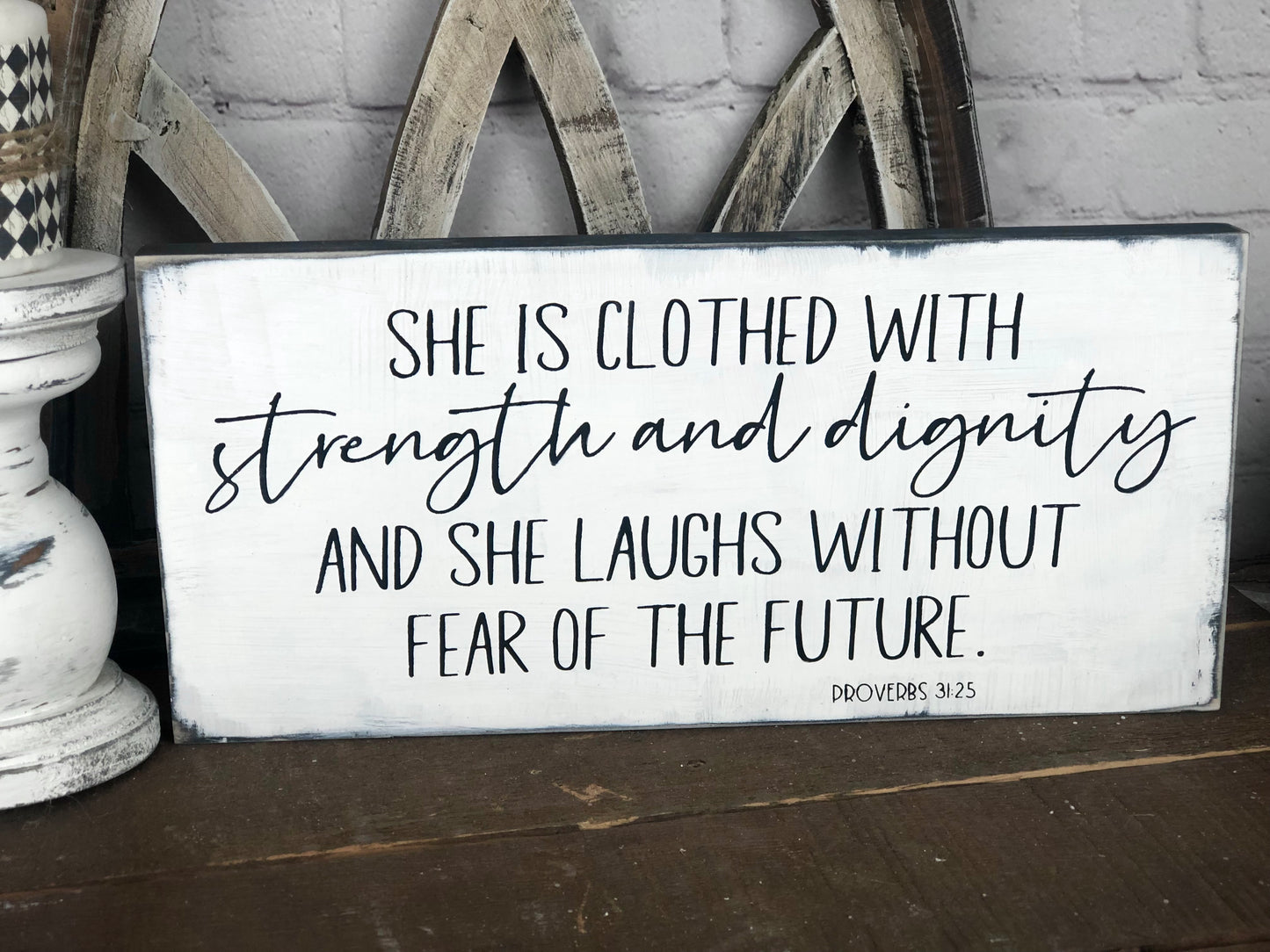 SHE IS CLOTHED WITH STRENGTH AND DIGNITY AND SHE LAUGHS WITHOUT FEAR OF THE FUTURE - WOOD SIGN
