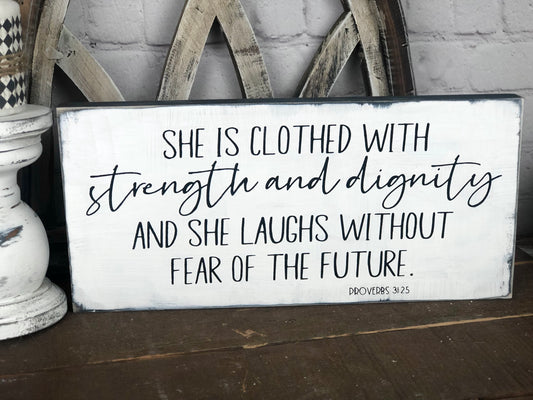 SHE IS CLOTHED WITH STRENGTH AND DIGNITY AND SHE LAUGHS WITHOUT FEAR OF THE FUTURE - WOOD SIGN