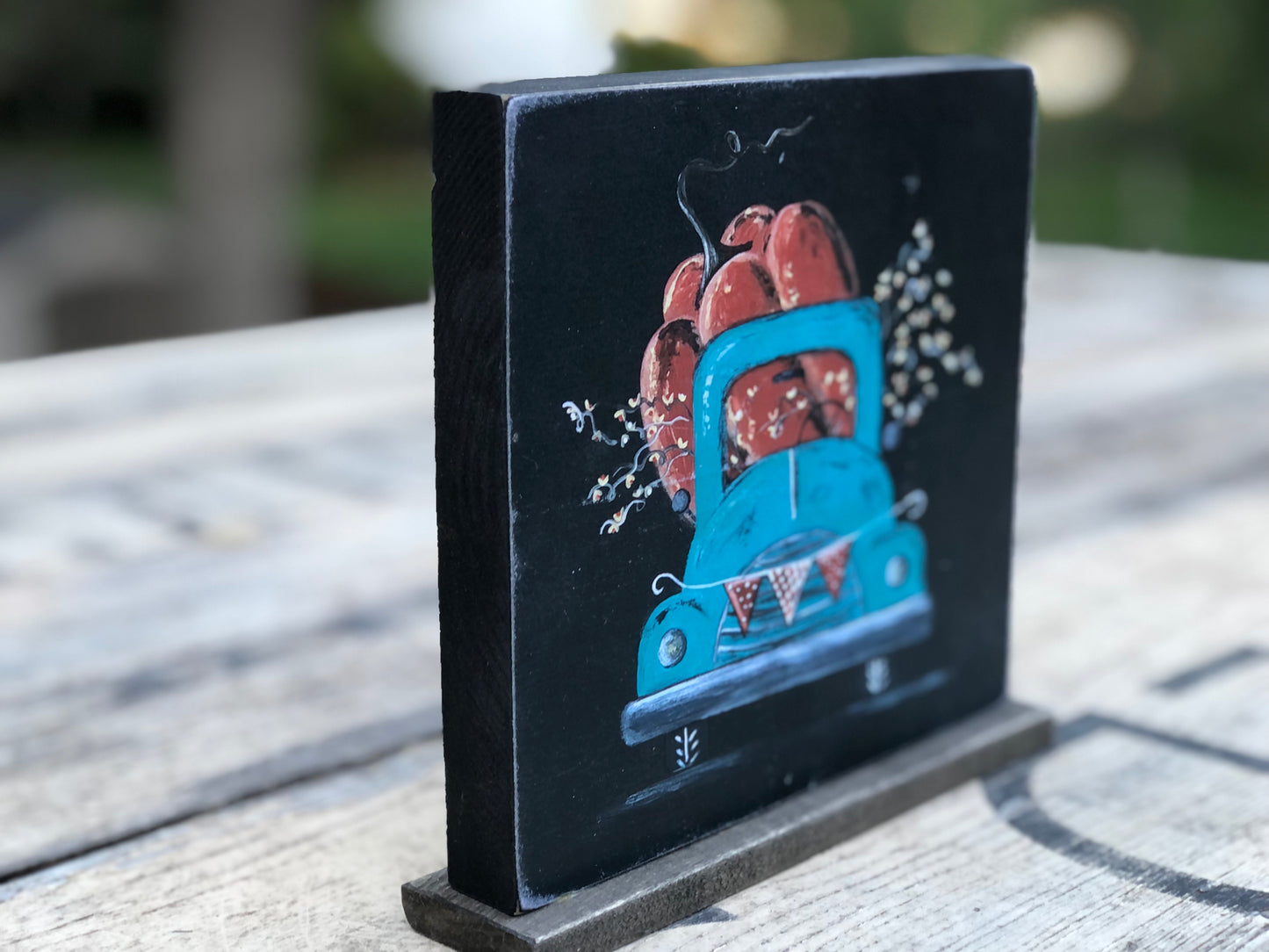 TRUCK -5.75 IN. TURQUOISE WITH PUMPKIN PRINT ON STAND - WOOD SIGN