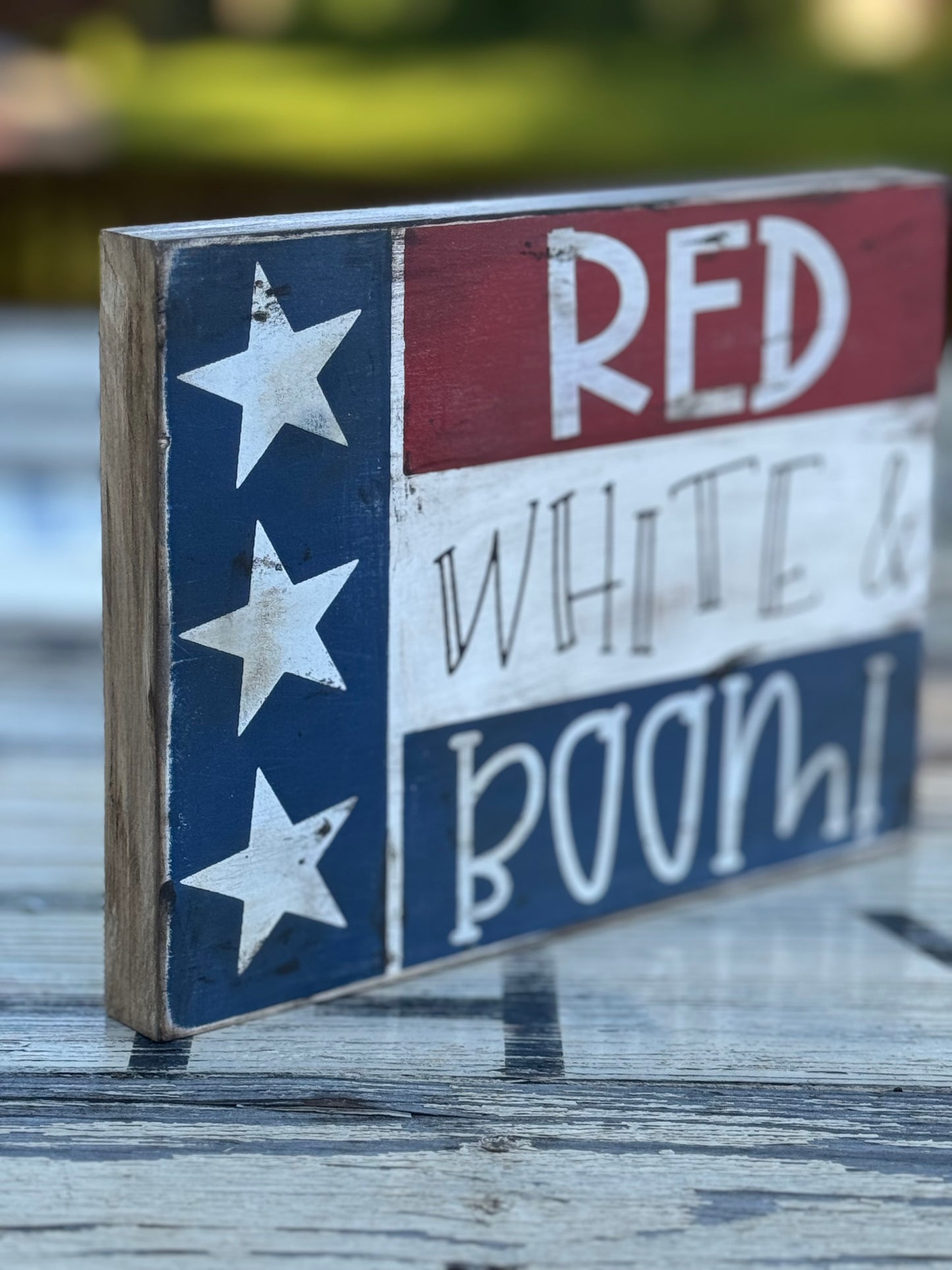 RED WHITE AND BOOM WOOD SIGN