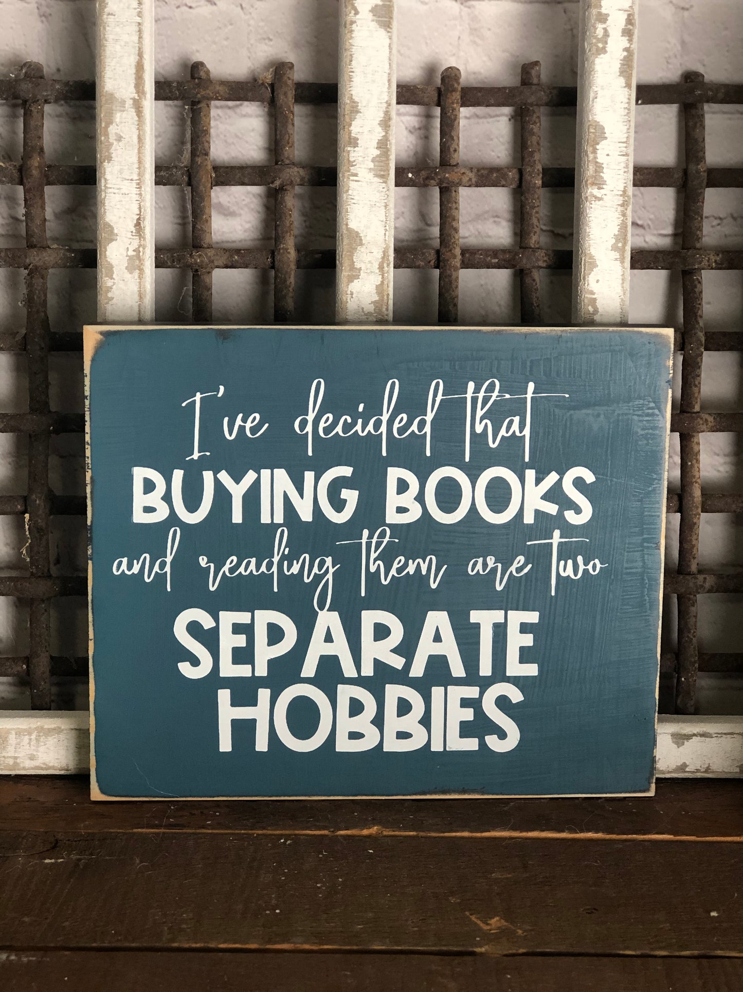 I'VE DECIDED THAT BUYING BOOKS AND READING THEM ARE TWO SEPARATE HOBBIES - WOOD SIGN